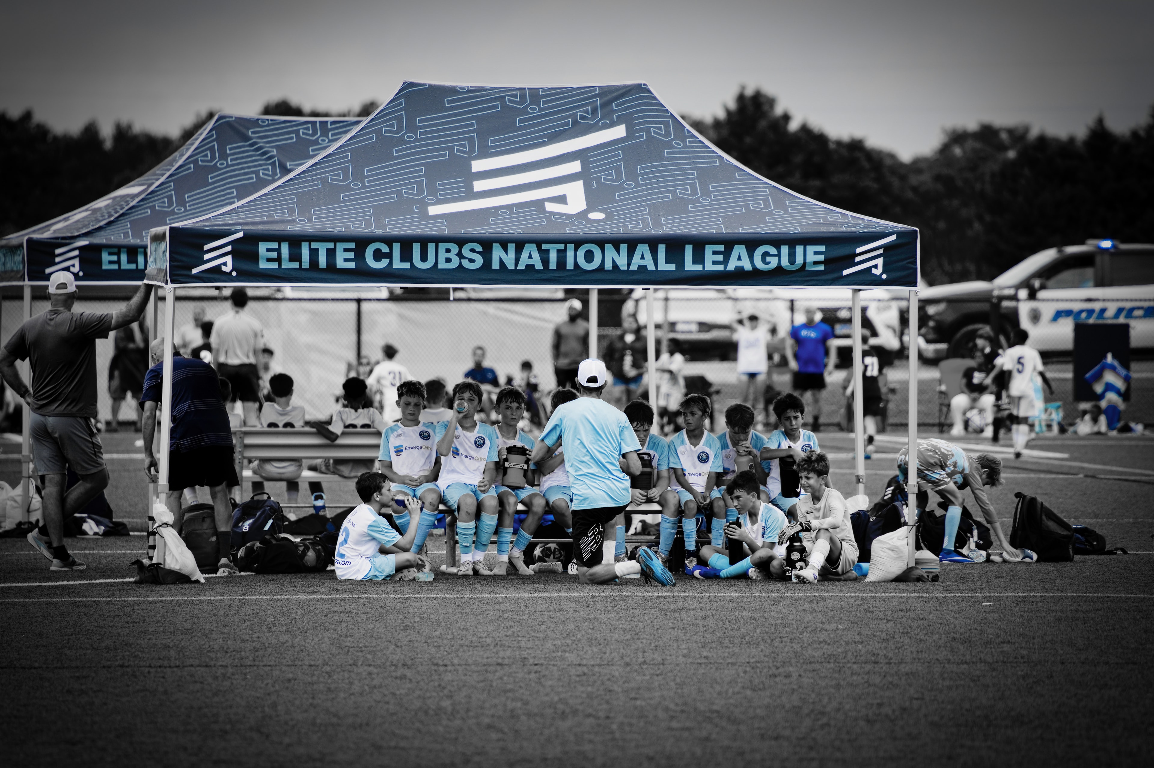 Hammerheads squad gathered under Elite Clubs National League tent at halftime